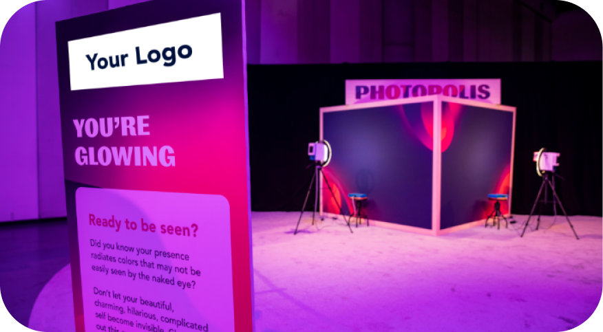 A promotional display for a photo booth labeled 